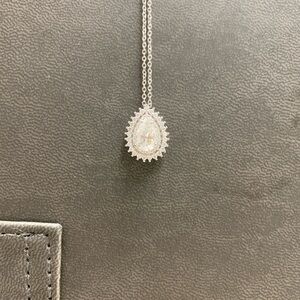 Pear Shaped Moissanite & Silver Pendant with Halo